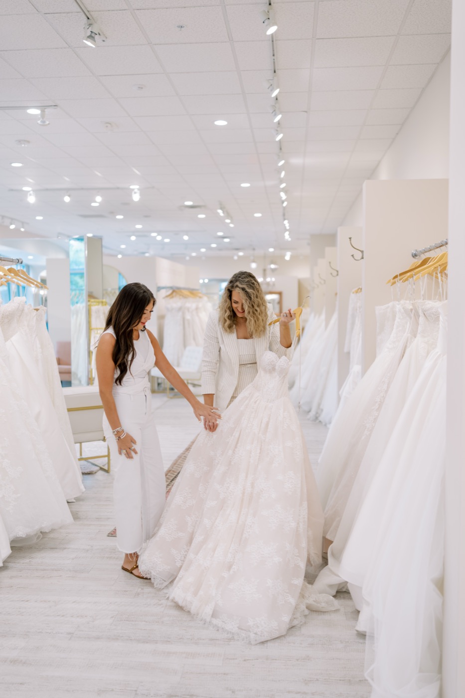 Bride trying on a wedding gown with her consultant at Brickhouse Bridal