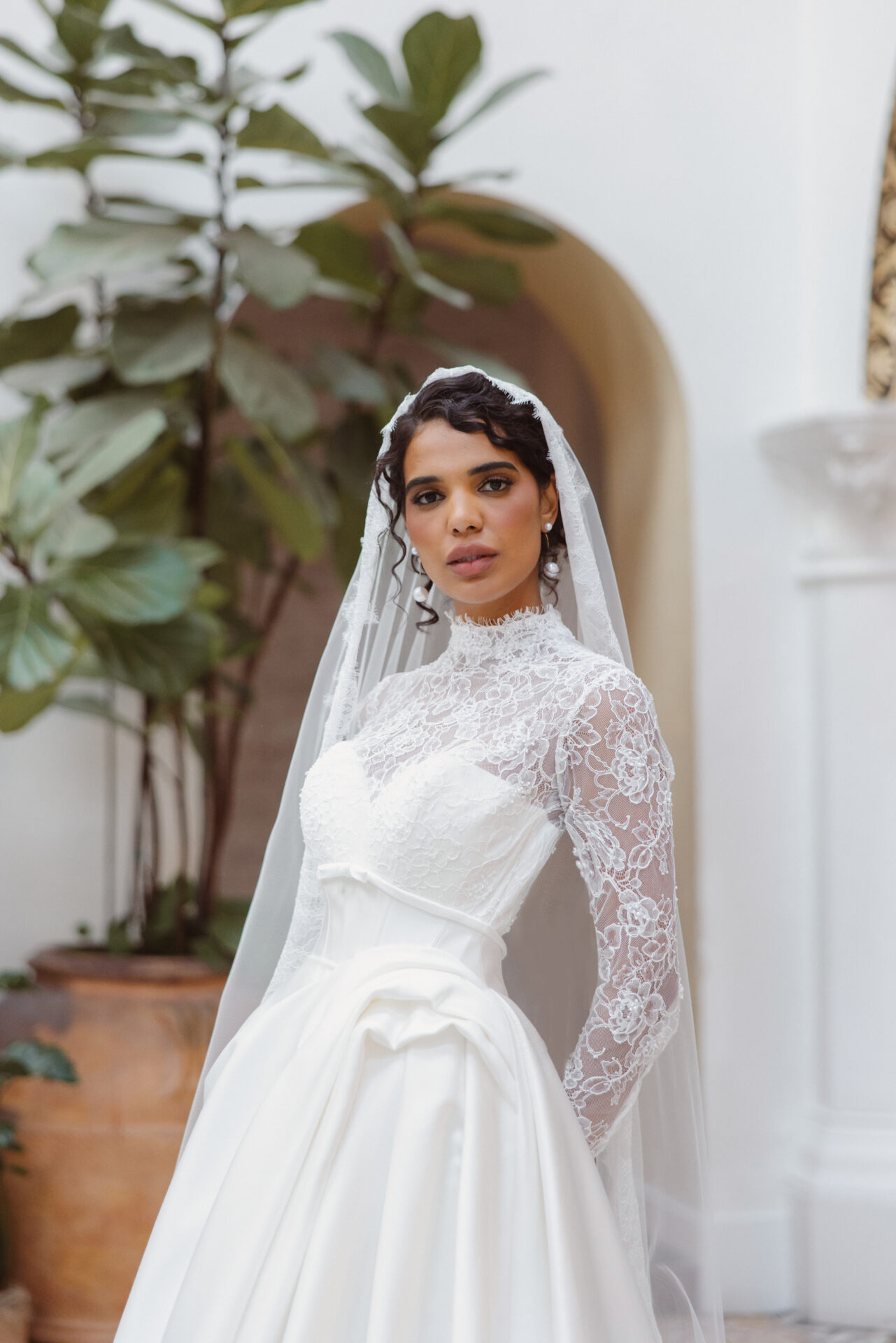 Bride in an Essense of Australia strapless lace ballgown