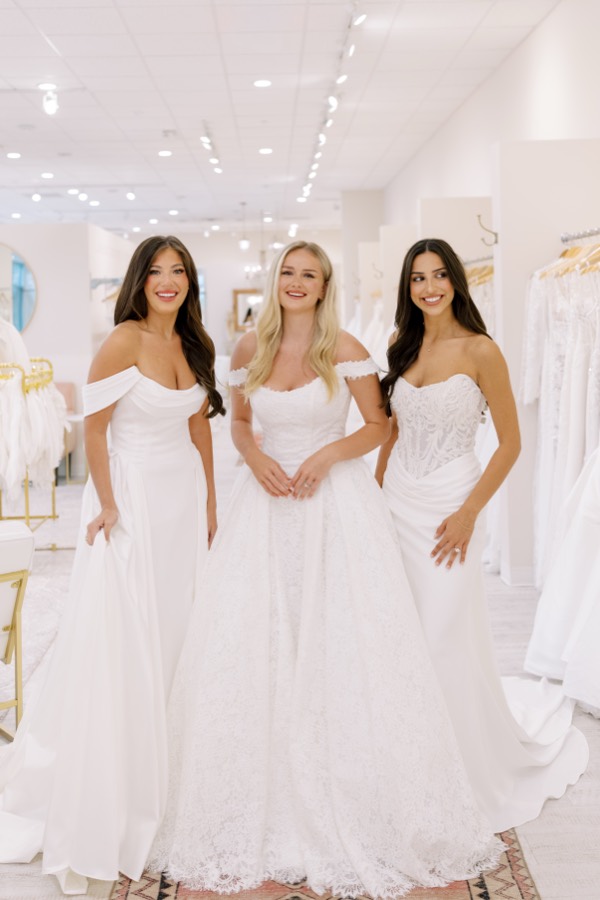 Three brides in wedding gowns at Brickhouse Bridal