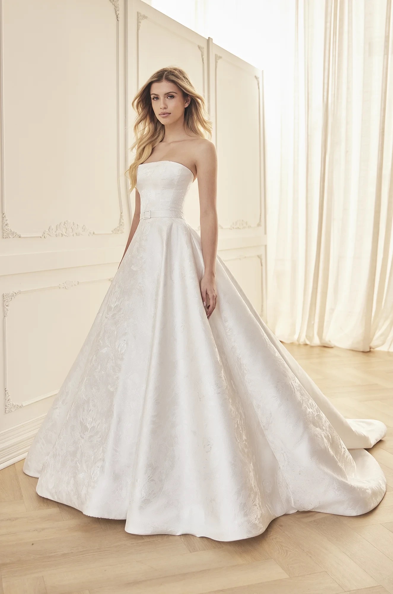 Bride in a Mikaella strapless ballgown