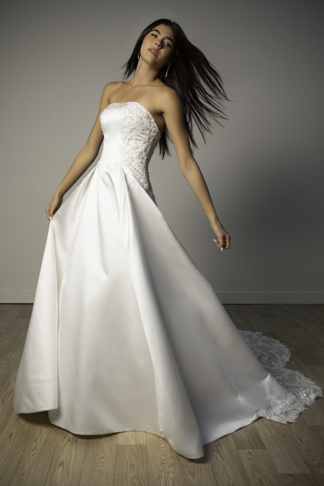 Bride in a Stella York off-shoulder ballgown with long sleeves