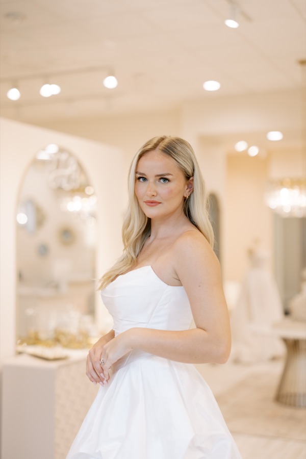 Bride celebrating after saying yes to her dress at Brickhouse Bridal