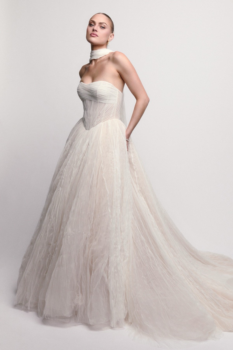 Bride in a Watters tulle a-line gown with a draped bodice